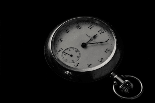 Round Pocket Watch at 12:05 Round Pocket Watch at 12:05